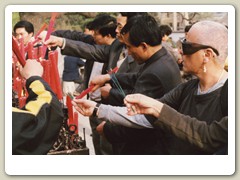 Kirsten lighting incense at the temple