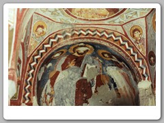 Frescoes on the walls of a large church carved in the soft stone