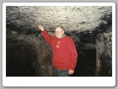 John showing the height of the ceiling - must have been short people